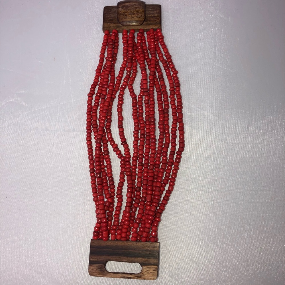Red bracelet with wood clasp